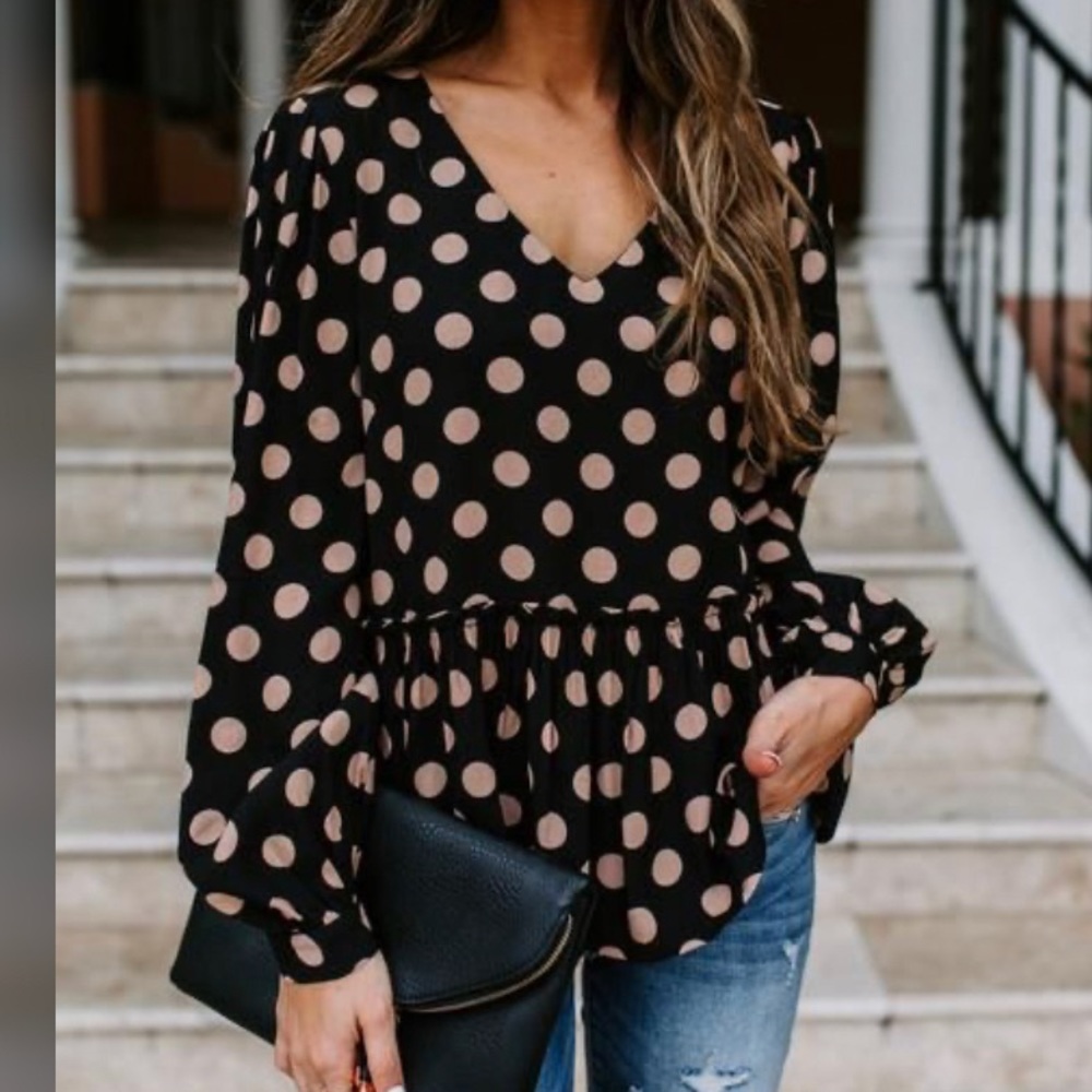 Black and pink polka dot peplum top